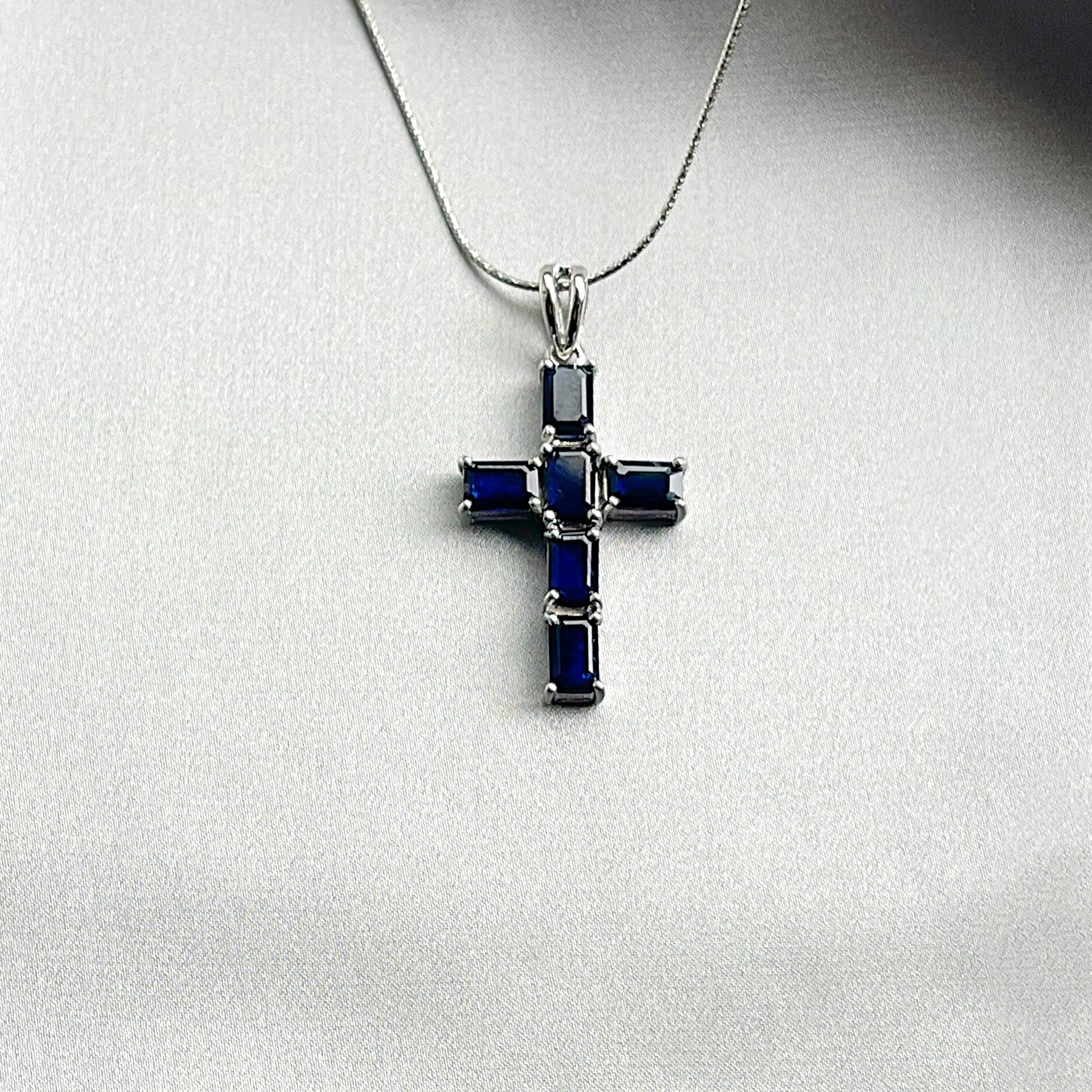Genuine sapphire cross best sale necklace