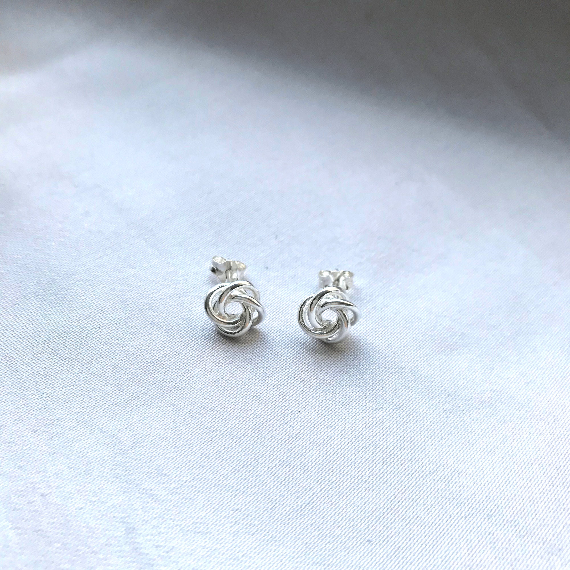 ピアス STONEHENgE Love Knot silver cubic earrings il_fullxfull.2804190069_gzbq.jpg