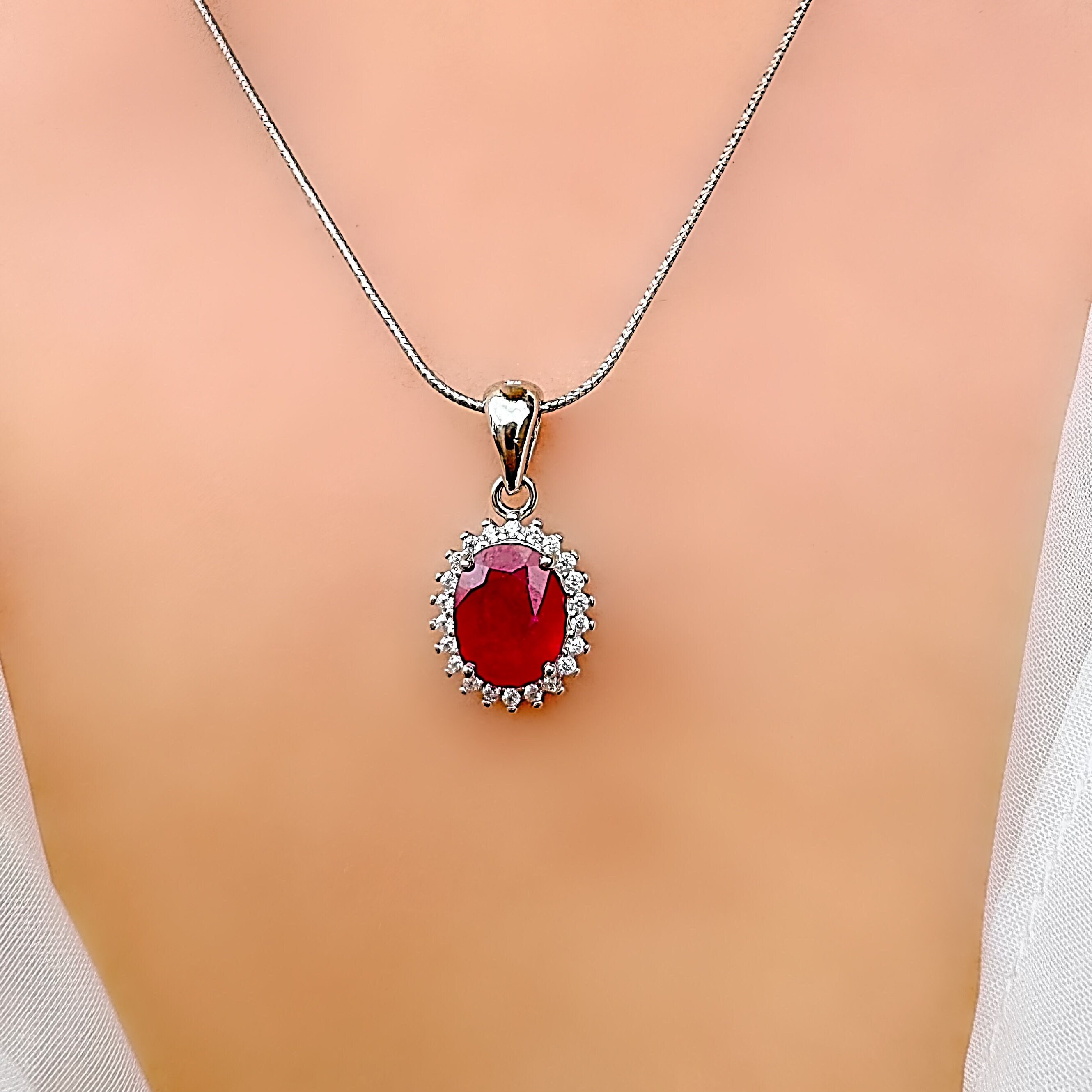 Gem Stone King 5.00 Ct Oval Red Created Ruby Sterling Silver Pendant With 18" Chain