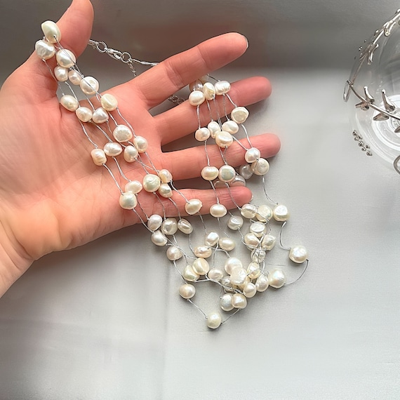 Floating freshwater pearl best sale necklace
