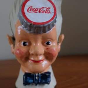 Sprite Boy is advertising Coca Cola | Cast Iron