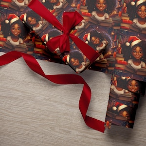 May include: Red ribbon wrapped around a gift box with a festive design featuring a pattern of a young girl wearing a Santa hat and reading a book. The girl is surrounded by books and a warm glow.