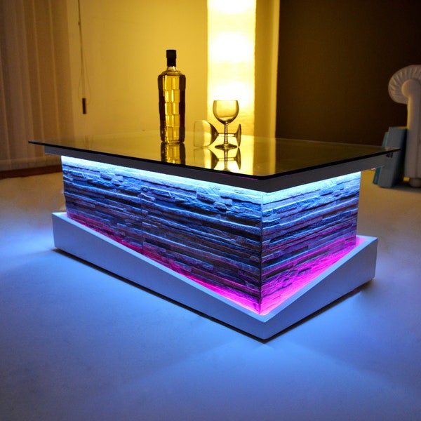 Table basse modèle Stone avec lumières led - plateau en verre