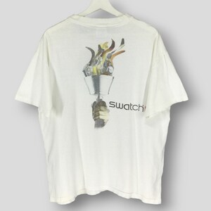 Camiseta vintage de los años 90 de Swatch Olympic Atlanta, coleccionable, oficial de los Juegos Olímpicos de 1996, con costuras sencillas, color blanco, talla grande.