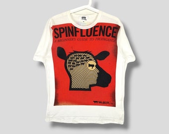 Comme des garcons eYe Junya watanabe spinfluence tshirt Japanese designer propaganda art clothing preppy casual outfit white Medium