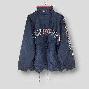 Vintage 90s Nike just do it spellout embroidered logo jacket streetwear mens windbreaker full zipper blue light jacket size Large