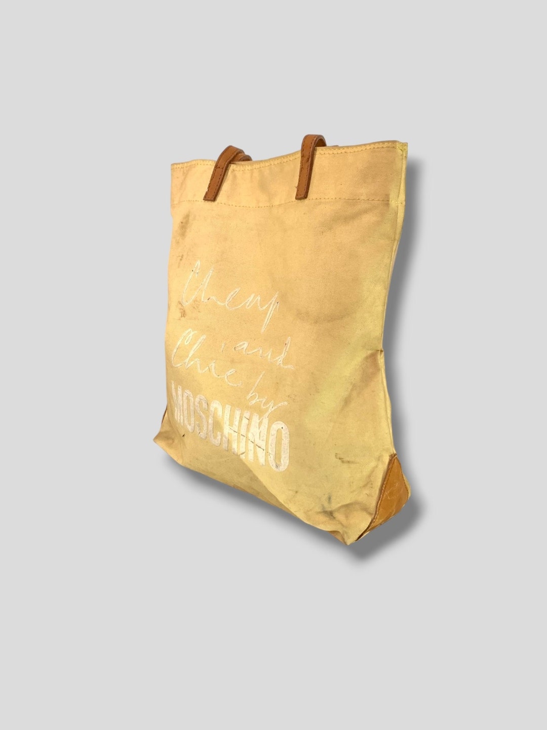 トートバッグ Moschino Leather Bag. Moschino Morphed Buckle Leather Tote Bag | Black | FARFETCH