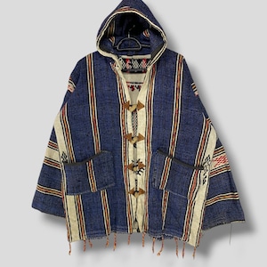 May include: A blue and white striped hooded jacket with a brown toggle closure. The jacket has two pockets and a fringe trim.
