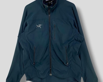 Vintage Arc'teryx soft shell schoeller stretch fabric jacket athletic streetwear outdoor outfits arcteryx canada gorpcore dark green Medium
