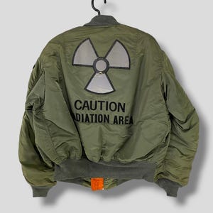 Chaqueta bomber MA-1 vintage de los años 90 con logotipo bordado de Alpha Industries, estilo militar, informal, para uso exterior, reversible, para pilotos de vuelo