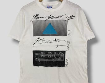Vintage 80s New York City music dance art tshirt collectible gravity graphic streetwear casual outfit graffiti art clothing white medium