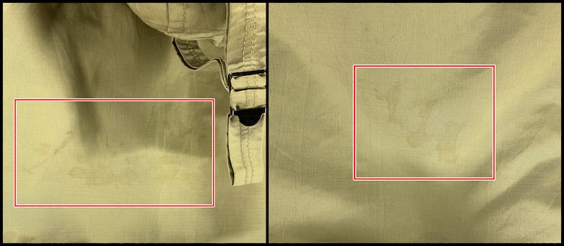 Puede incluir: Primer plano de una tela color caqui con manchas y arrugas visibles. La tela parece ser parte de una prenda, con una porci&oacute;n de un cintur&oacute;n y hebilla visibles en el lado derecho. La textura de la tela es ligeramente arrugada.