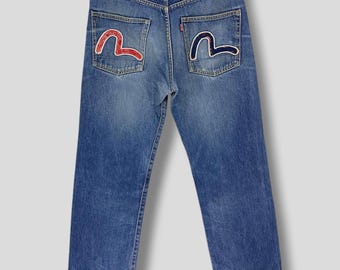 Vintage y2k Evisu embroidered logo custom jeans streetwear casual fan art distressed jeans blue size W32