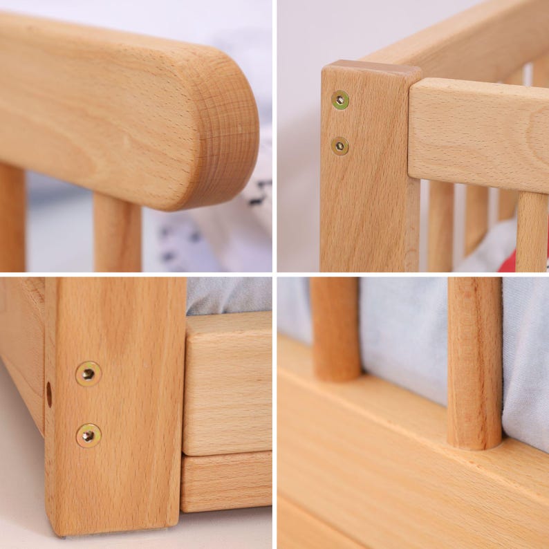 May include: Close-up shots of a light-colored wooden crib. The crib features rounded edges, vertical slats, and visible screw details. The wood grain is prominent, and the overall design is simple and modern.