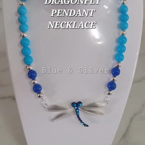Necklace- TEEN- GIRLS- DragonFly Pendant- Blue Necklace with Silver and golden Pendants.