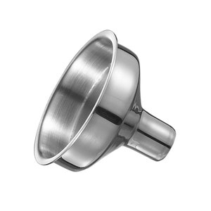 May include: A polished silver-colored metal funnel with a wide, circular top opening that tapers down into a narrow cylindrical spout. The interior surface shows a brushed texture, while the exterior has a smooth, reflective, and metallic finish.