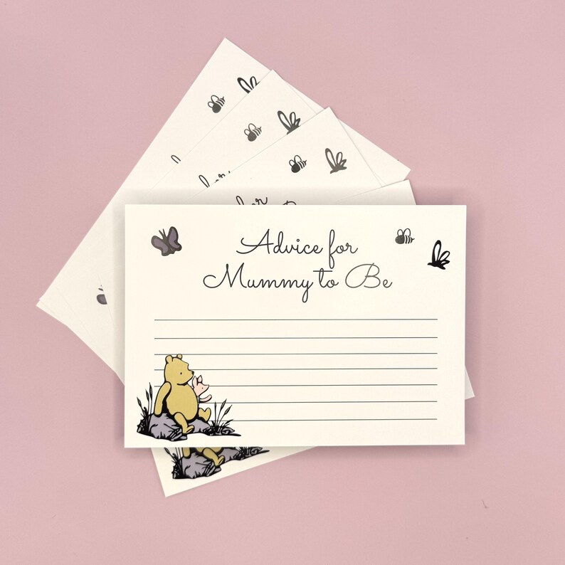 May include: A set of Winnie the Pooh themed baby shower advice cards. The cards are white with black lines and feature a drawing of Winnie the Pooh and Piglet. The text on the cards reads "Advice for Mummy to Be".
