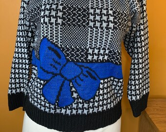 Black and White Hounds Tooth Sweater with Big Blue Bow