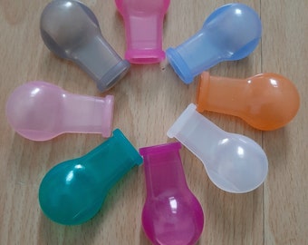 Coloured reinforced and clear teats for adult pacifiers