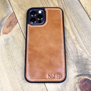 Handmade Buck Brown leather iPhone case with personalization. iPhone cases include: 12, 13, 14, and 15. Phone case for men or women.