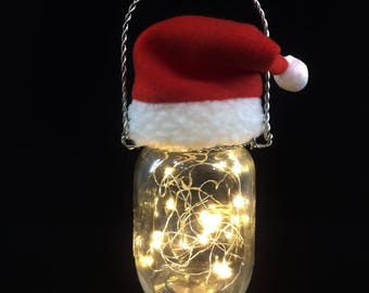 Hanging mason jar Christmas holiday battery fairy lights luminary with Santa hat white