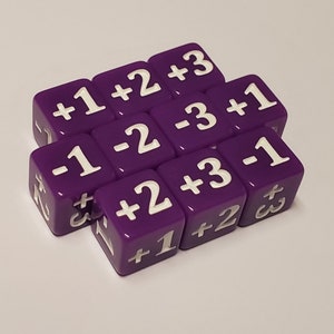 May include: A set of ten purple dice with white numbers. The dice have the following numbers: +1, +2, +3, -1, -2, -3, +1, +2, +3, -1.