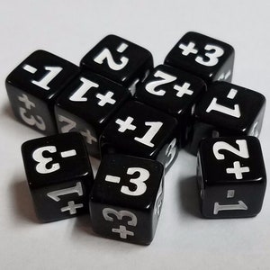 May include: A group of ten black dice with white numbers and plus signs. The dice are scattered on a white surface.