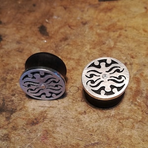 Earplug diameter: inside 16.5 mm outside 17.5 mm at the back, 18.2 at the front riveted in ebony and 925 silver