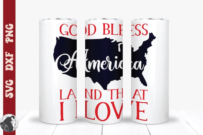 May include: White tumbler with a patriotic design. The design features a dark blue outline of the United States with the words "America" in a cursive font. The words "Good Bless" and "Land That I Love" are in red.