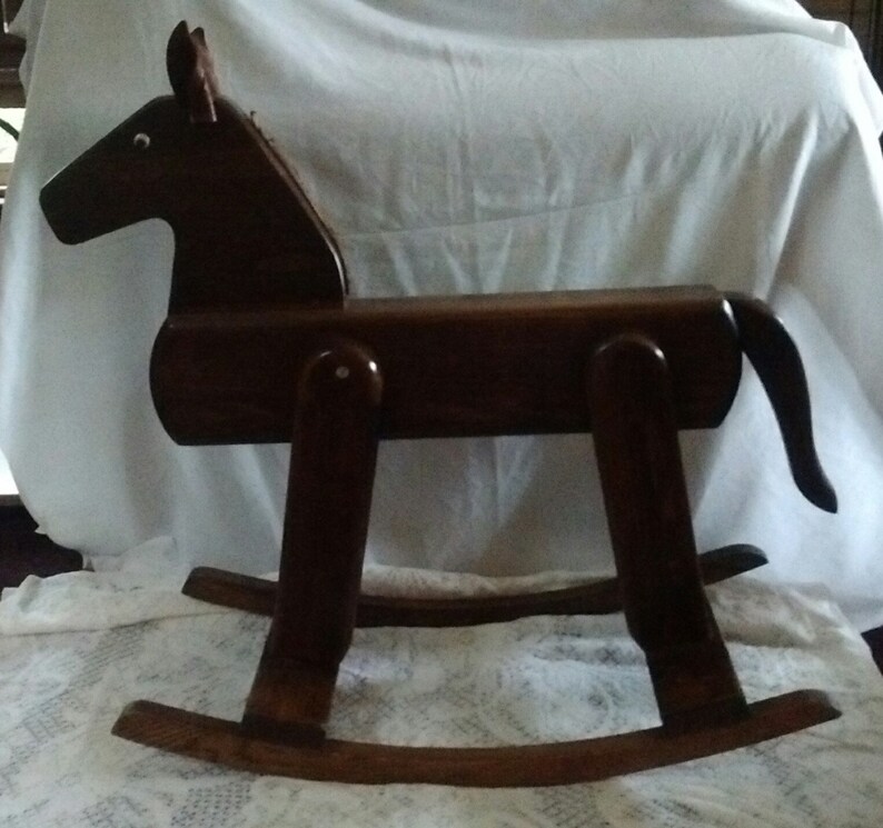 child's wooden rocking horse