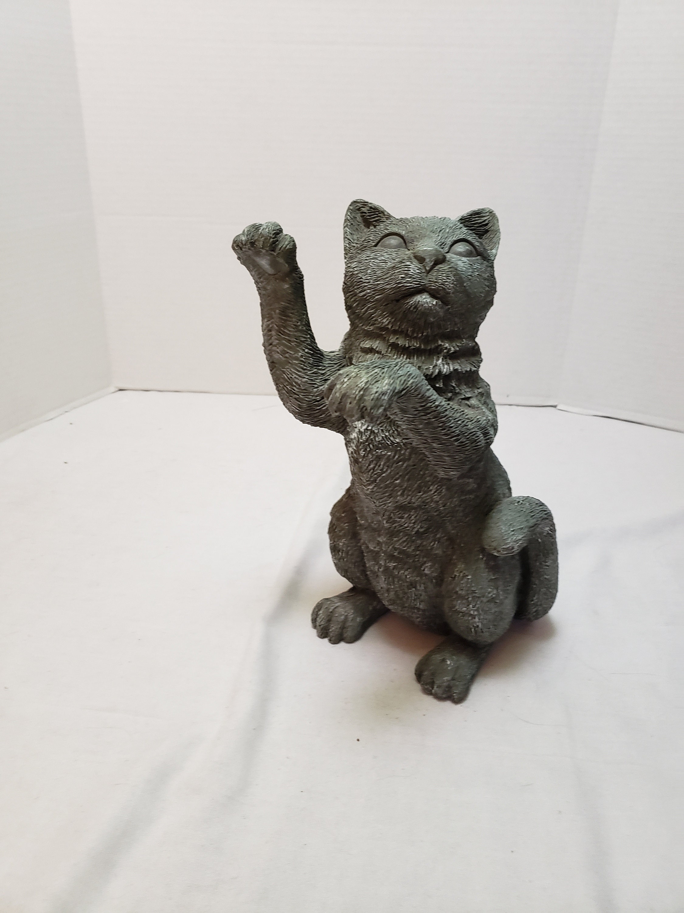 grey tabby cat statue