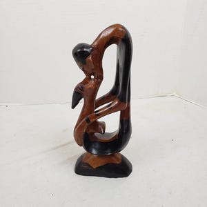 Hand Carved Hand Painted Wood Infinity Statue of Man and Woman Kissing 12" x 5"