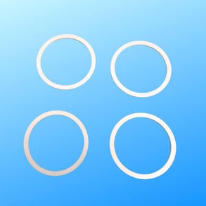 May include: Four white circular objects are arranged against a gradient blue background. Each object is a ring shape with a consistent width. The objects are evenly spaced and appear to be made of a solid material.