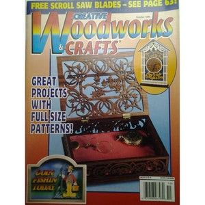 May include: The cover of "Creative Woodworks & Crafts" magazine, October 1996 issue. Features a wooden jewelry box with intricate floral cutouts, open to reveal a red interior and antique accessories. Text includes "Great Projects with Full Size Patterns!"