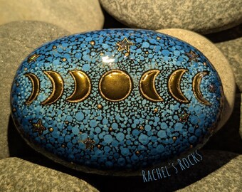 Dotted Moon phases. Hand painted Lake Superior stone. Size approximately 5 inches.