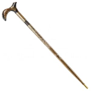 May include: A decorative walking stick with a gold and black patterned design. The handle is curved and has a gold finish.