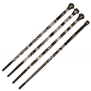 May include: Four decorative walking sticks with intricate patterns of inlaid bone and gold accents. The sticks have a dark brown finish and ornate, rounded tops.