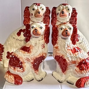 A Set of Four Antique Russet Staffordshire Dogs