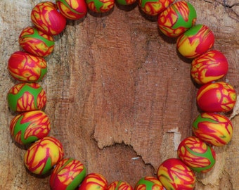 Bracelet in yellow orange rotund green