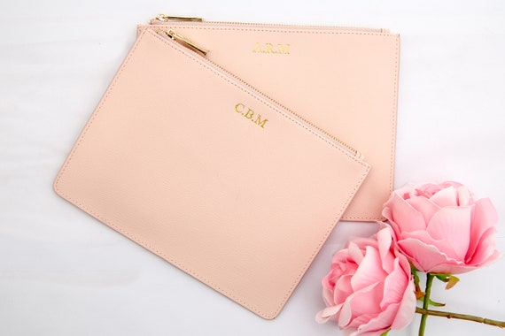 pastel pink clutch bag