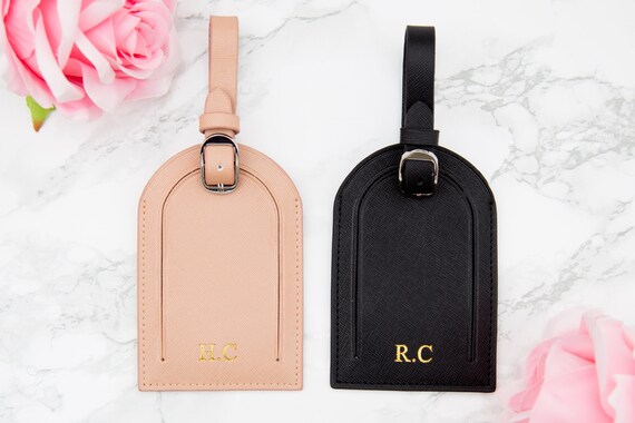 black leather luggage tags