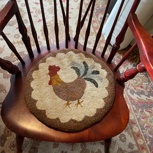 hook and braid round rooster rug by Bob Timberlake