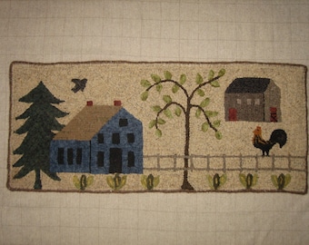 May include: A needlepoint rug depicting a farmhouse scene with a blue house, a red barn, a green tree, a rooster, and a fence. The rug is made with a variety of colors and textures.