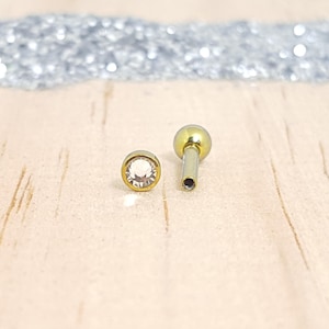 Zirconia Bezel Set and Gold Titanium Barbell with Ball back