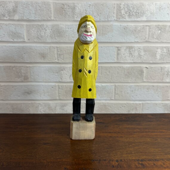 Fisherman in yellow coat cheap