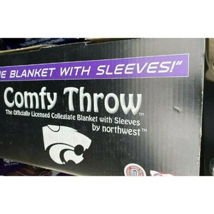 May include: A black box with the text "Comfy Throw" in white. The text "The Officially Licensed Collegiate Blanket with Sleeves by northwest" is also on the box in white. The box has a white and gray logo of a wildcat.