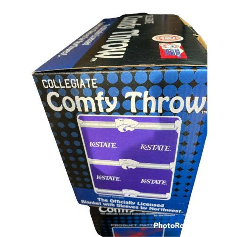 May include: Collegiate Comfy Throw blanket with sleeves, featuring the K-State logo in purple and white on a blue background. The officially licensed blanket is made by Northwest.