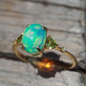 14 k gold ring with opal, peridot, diamonds. Dainty opal ring. Opal promise ring. Opal engagement ring. Oval opal ring. Opal vintage ring.