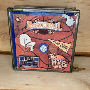 Caisse d'épargne en blocs de verre pour basket-ball