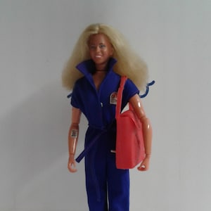 For thirty years, I have owned the original Bionic Woman doll released by  Kenner in 1977. Last week, I took notice of the doll in my curi